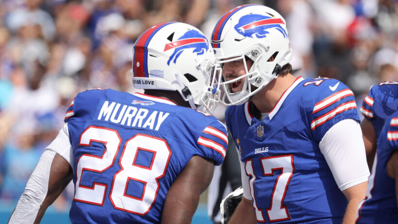 Bills QB Josh Allen celebrates with RB Murray.
