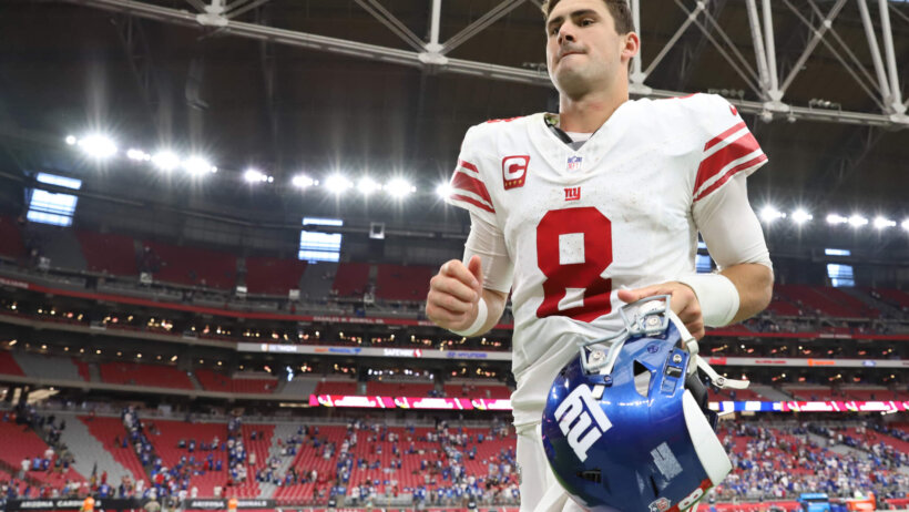 Daniel Jones runs off the field in Arizona.