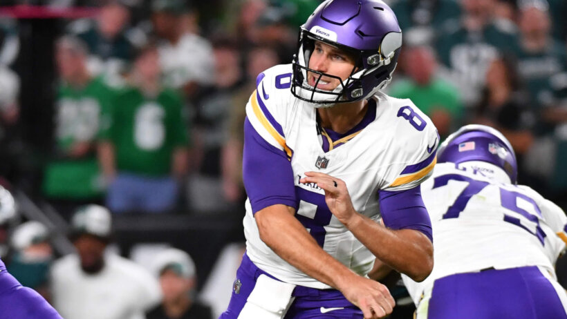 Minnesota Vikings quarterback Kirk Cousins throwing a pass