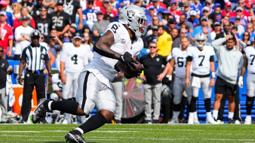 Las Vegas Raiders running back Josh Jacobs carrying the ball