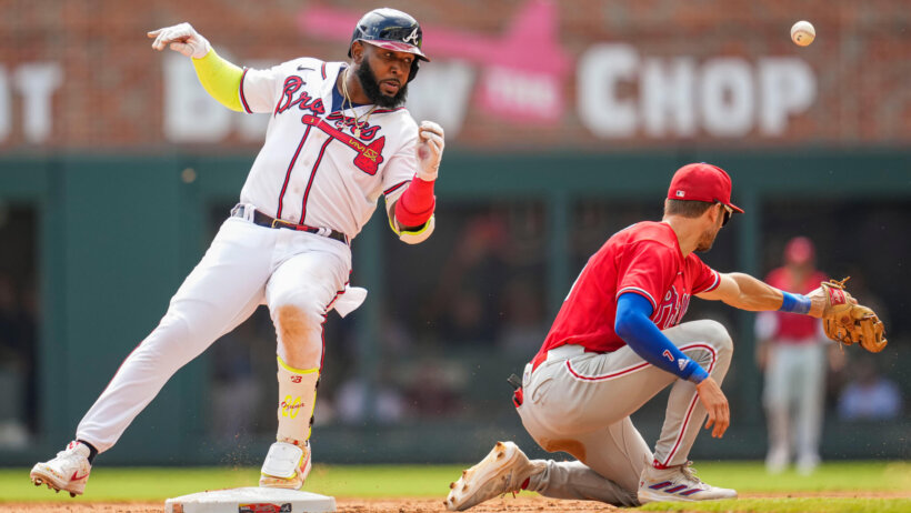 Atlanta Braves designated hitter Marcell Ozuna standing on second base