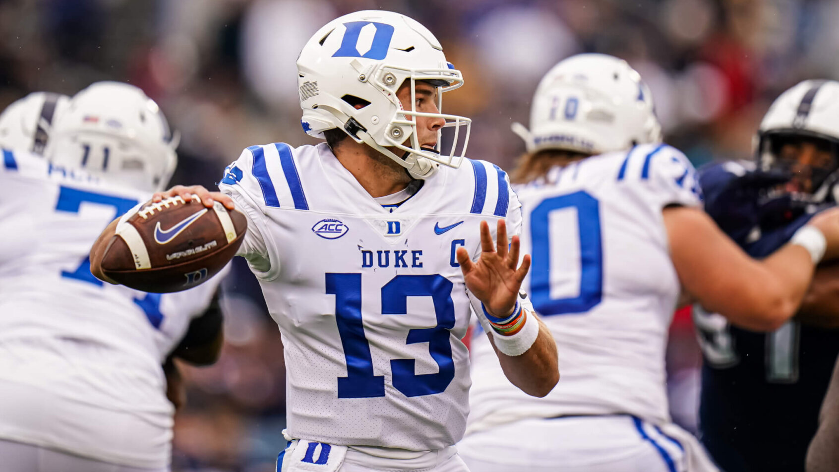 Duke Blue Devils quarterback Riley Leonard throws a pass