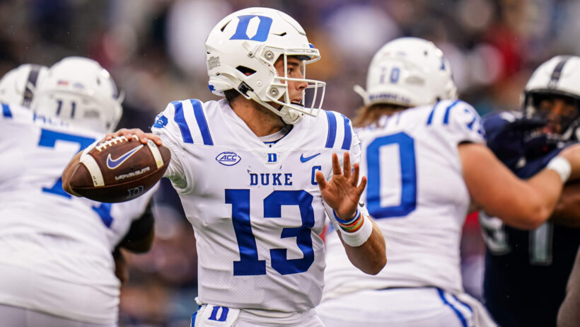 Duke Blue Devils quarterback Riley Leonard throws a pass