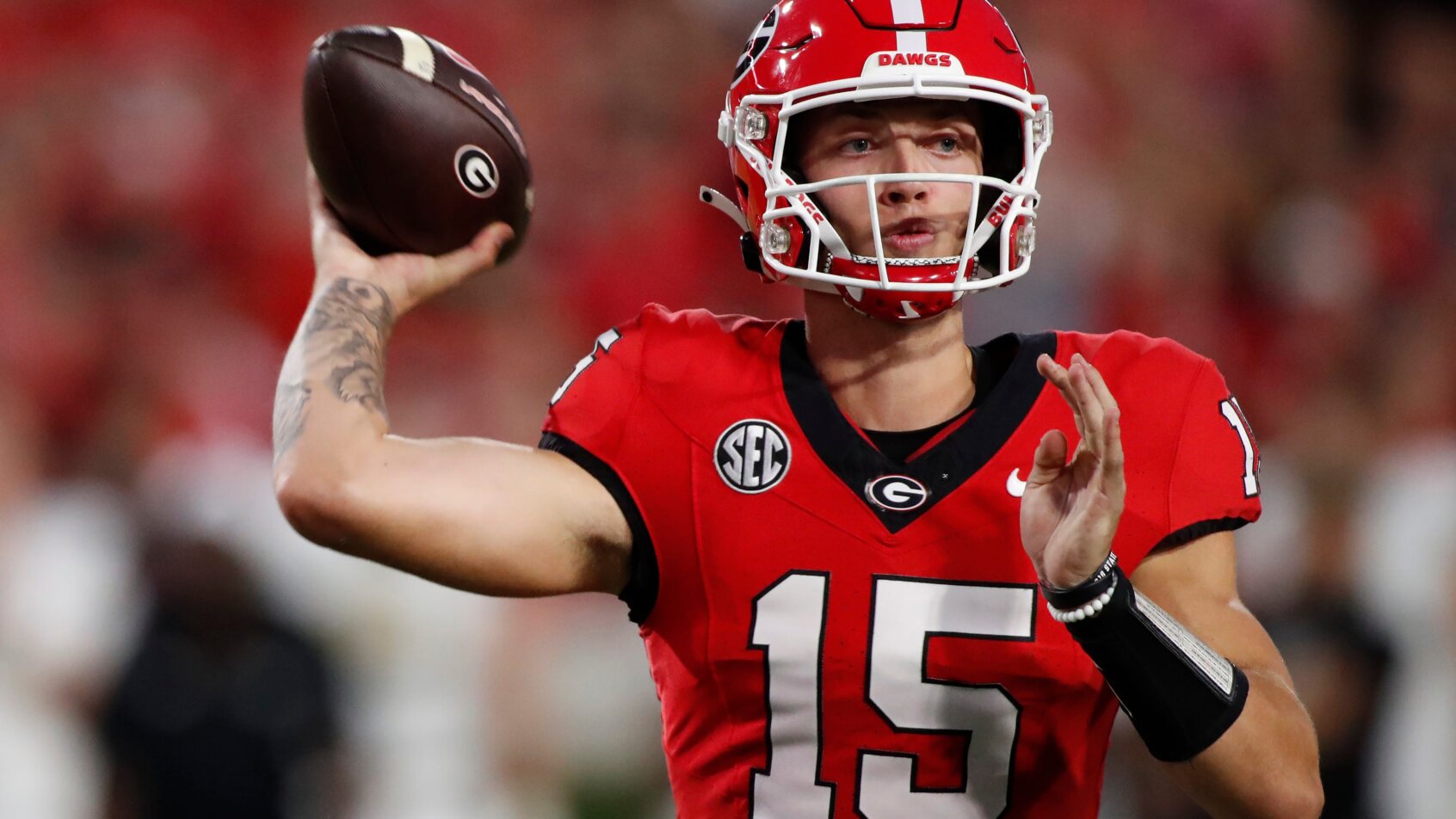Georgia quarterback Carson Beck throws a pass
