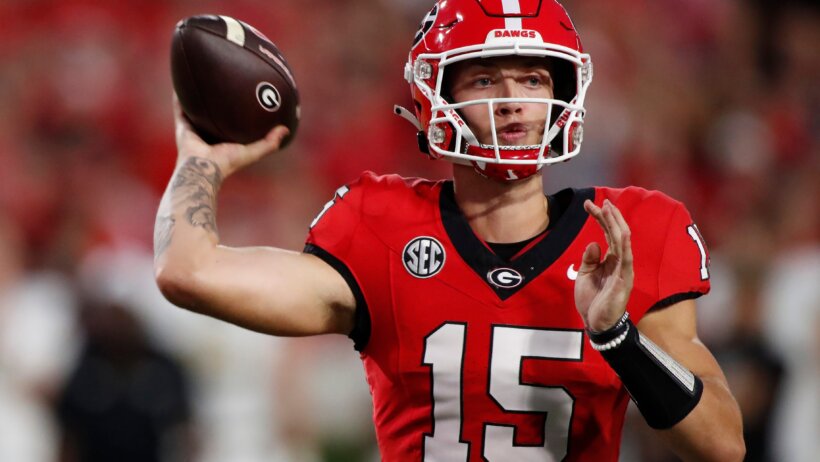 Georgia quarterback Carson Beck throws a pass