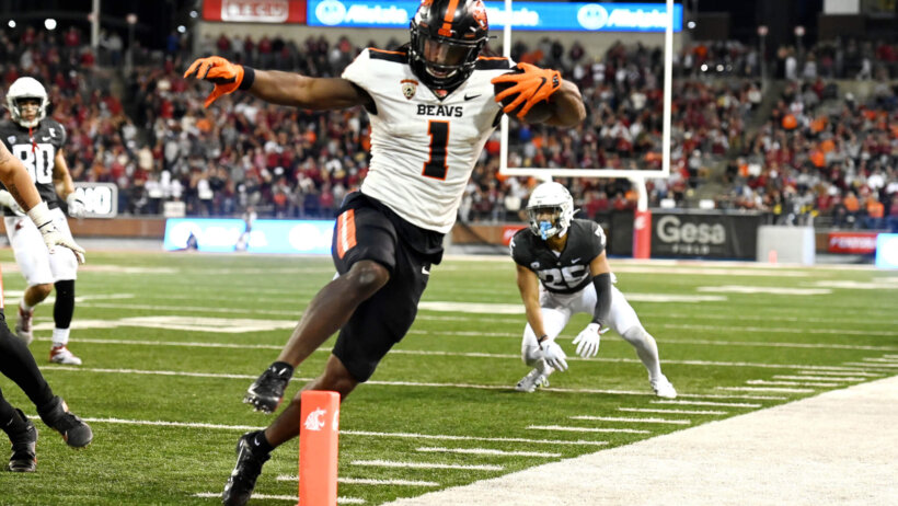 Deshaun Fenwick rushes for a TD versus Washington