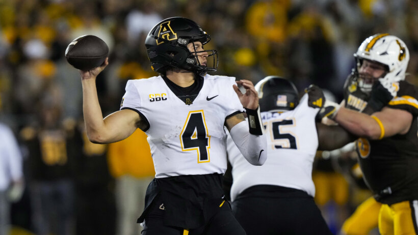 App State Mountaineers quarterback Joey Aguilar looks to throw