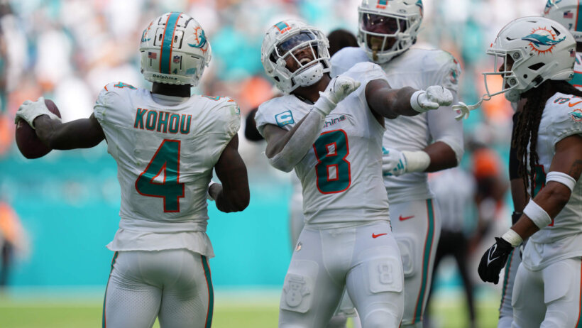 Miami Dolphins safety Jevon Holland celebrating an interception