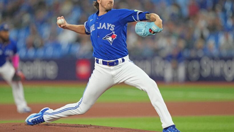 Toronto Blue Jays starting pitcher Kevin Gausman delivering a pitch