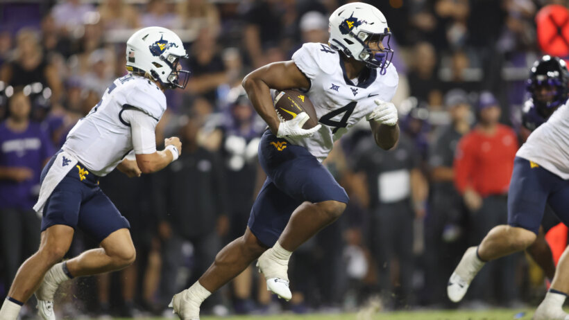 West Virginia Mountaineers running back CJ Donaldson Jr. runs the ball