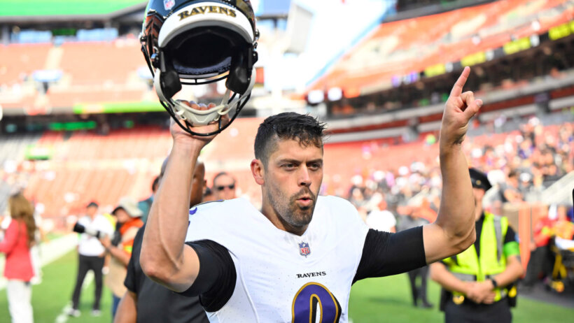Baltimore Ravens place kicker Justin Tucker (9) walks off the field after a win