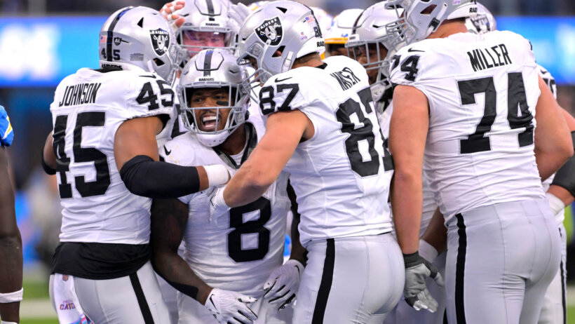 Las Vegas Raiders running back Josh Jacobs (8) celebrates a touchdown