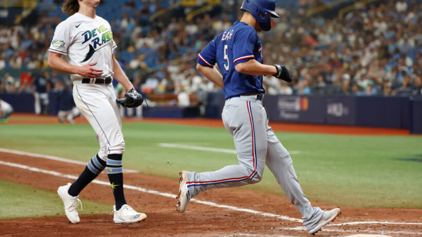 Texas Rangers shortstop Corey Seager crossing home plate