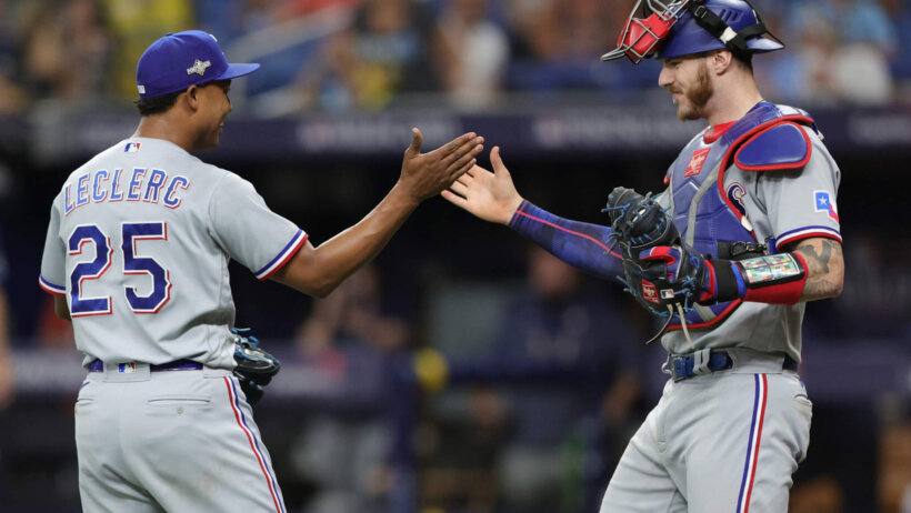 Texas Rangers relief pitcher Jose Leclerc celebrates with catcher Jonah Heim