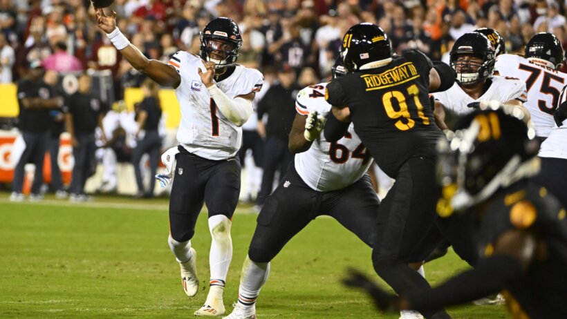 Chicago Bears quarterback Justin Fields (1) passes the ball