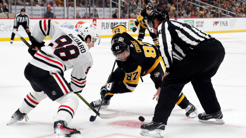 Sidney Crosby and Connor Bedard faceoff