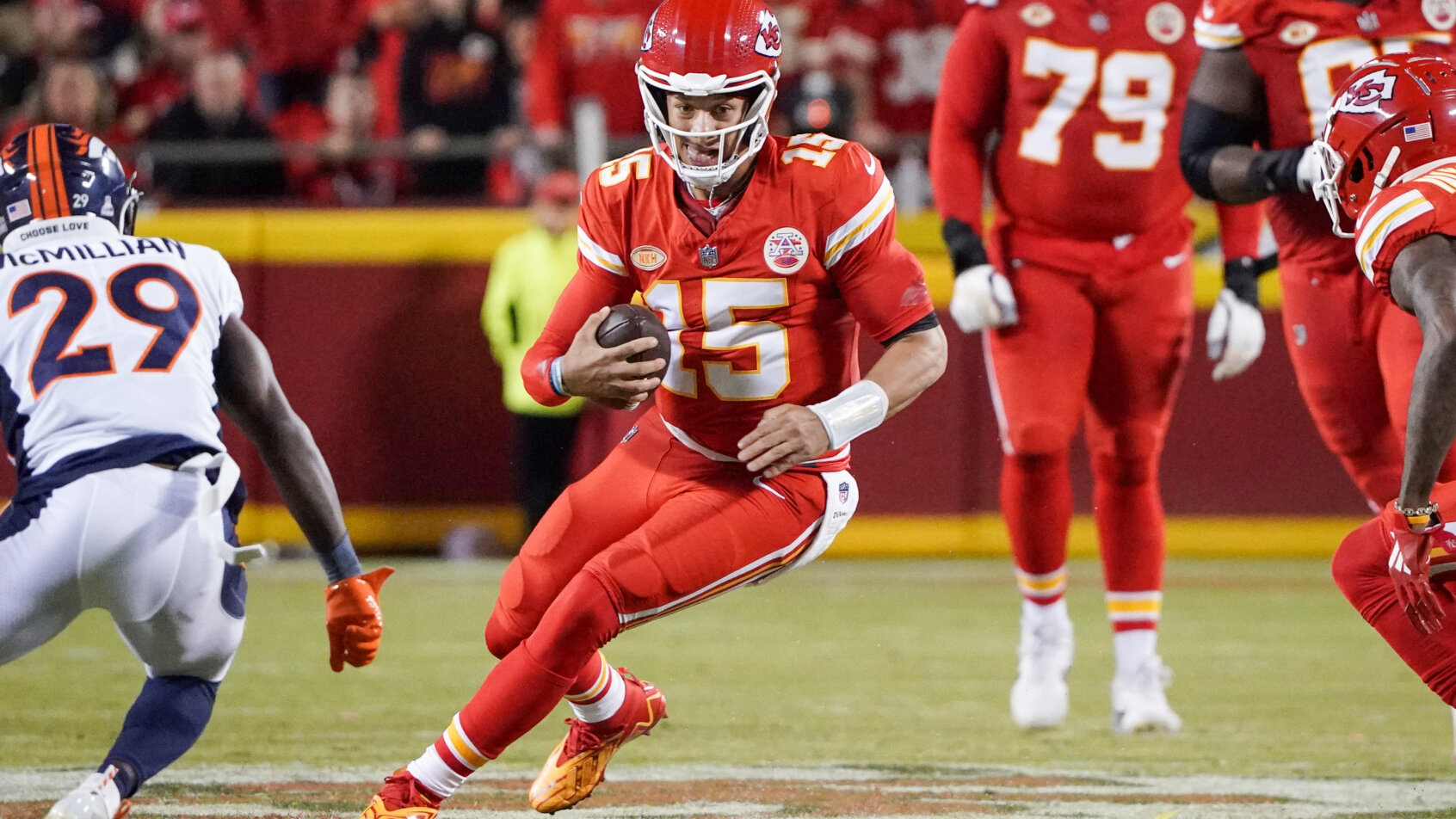 Kansas City Chiefs quarterback Patrick Mahomes (15) runs the ball