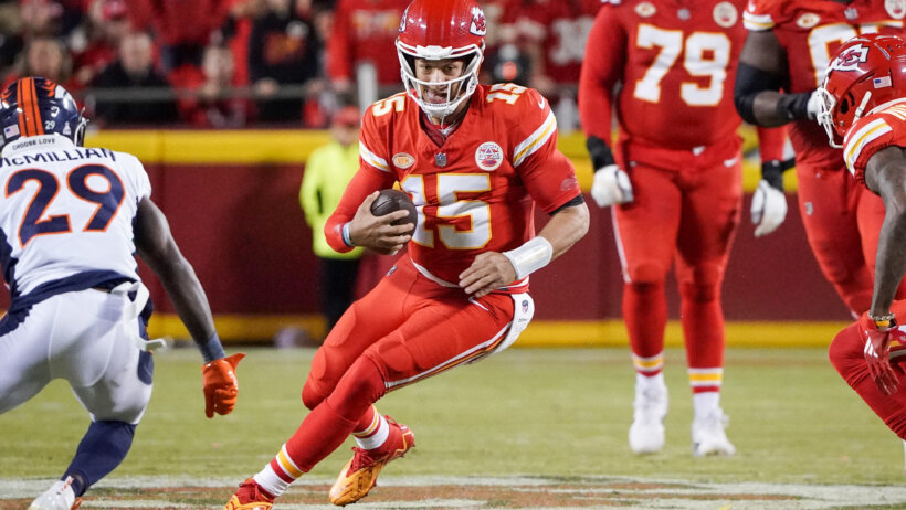 Kansas City Chiefs quarterback Patrick Mahomes (15) runs the ball