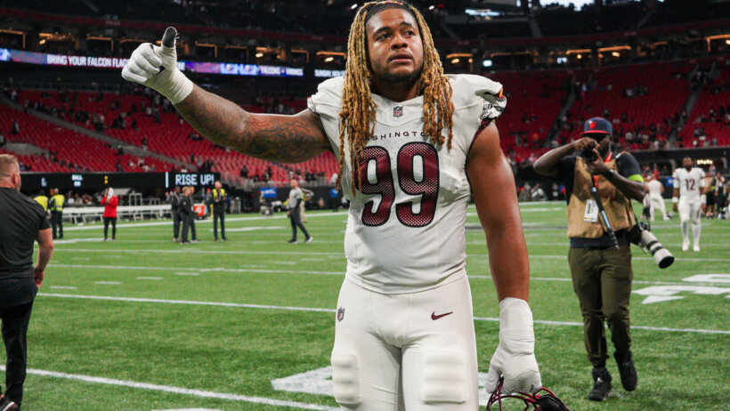 Washington Commanders defensive end Chase Young (99) reacts after a game