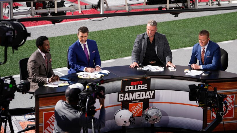 ESPN College Gameday set broadcasters at desk