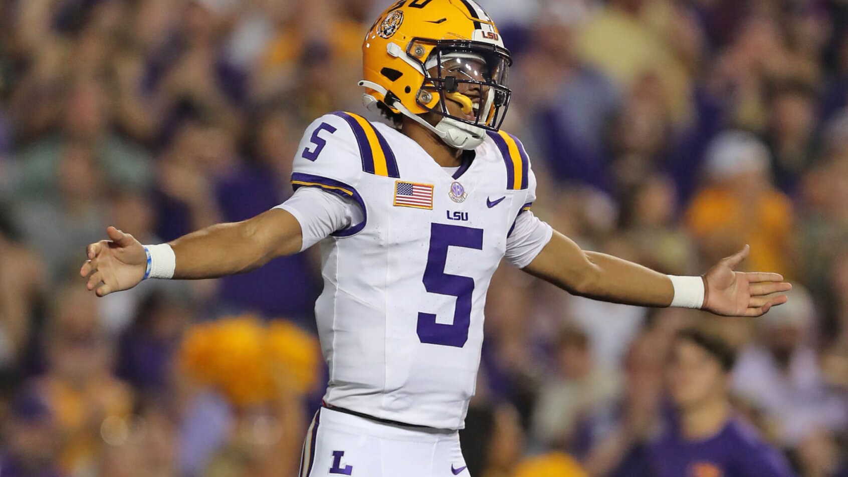 LSU Tigers quarterback Jayden Daniels celebrates a touchdown