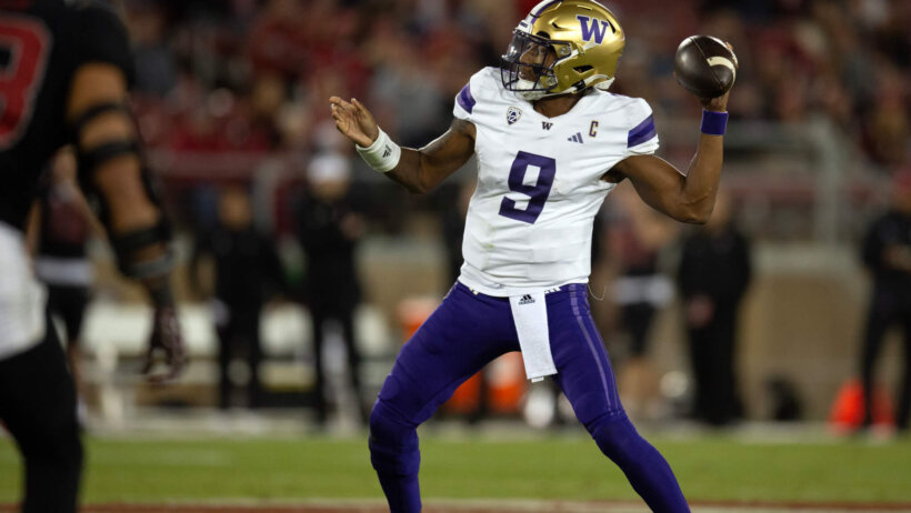 Washington Huskies quarterback Michael Penix Jr. drops to pass