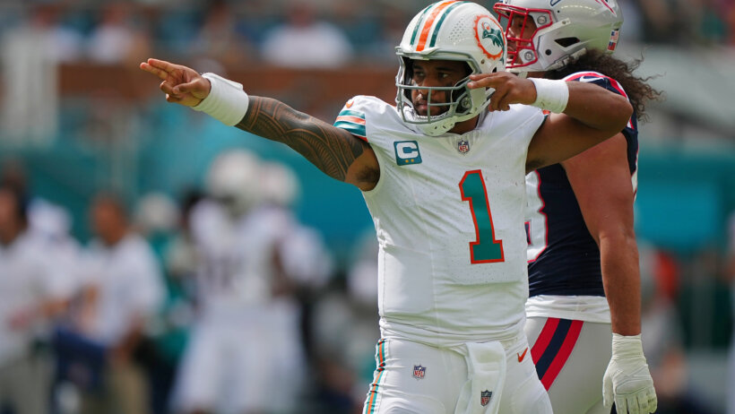 Miami Dolphins quarterback Tua Tagovailoa (1) celebrates