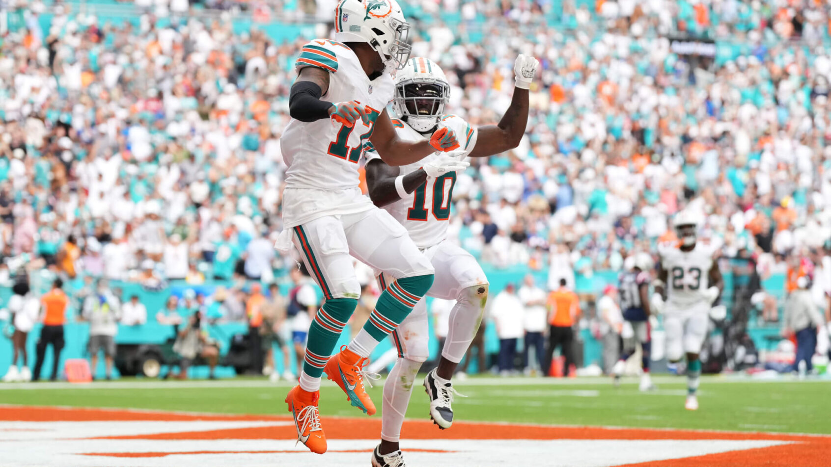 Miami Dolphins wide receiver Jaylen Waddle (17) celebrates his touchdown against the New England Patriots with wide receiver Tyreek Hill (10)