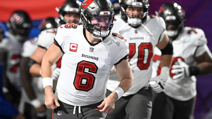 Tampa Bay Buccaneers quarterback Baker Mayfield (6) leads the team onto the field