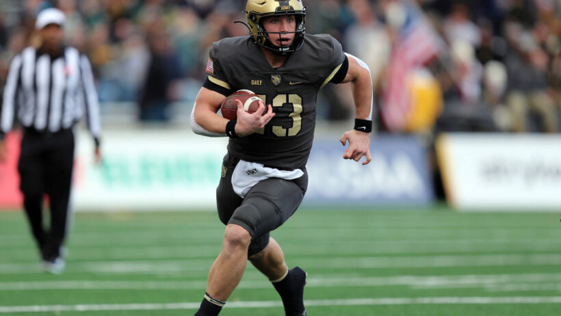 Army Black Knights quarterback Bryson Daily (13) carries the ball