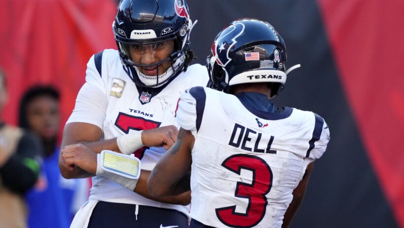 Houston Texans quarterback C.J. Stroud (7) celebrates a touchdown run
