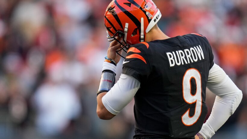 Joe Burrow wiping his eyes