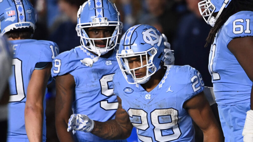 North Carolina Tar Heels running back Omarion Hampton with wide receiver Devontez Walker