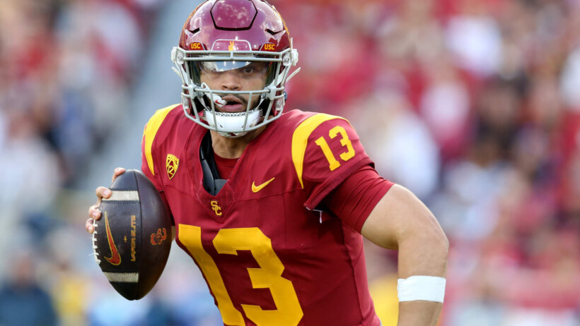 USC Trojans quarterback Caleb Williams scrambles