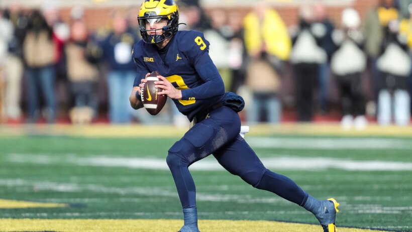 Michigan quarterback J.J. McCarthy looks to pass