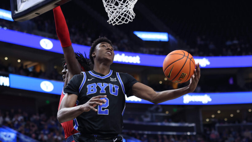 BYU guard Jaxson Robinson goes for a layup against Fresno State