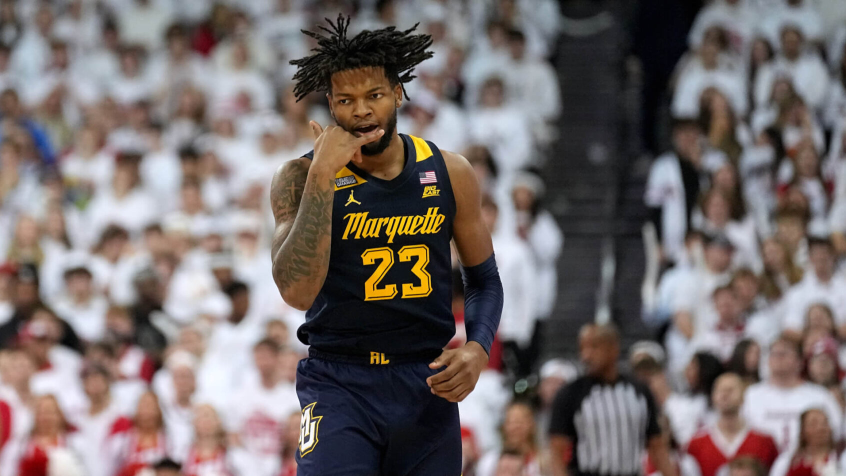 Marquette forward David Joplin celebrates hitting a three