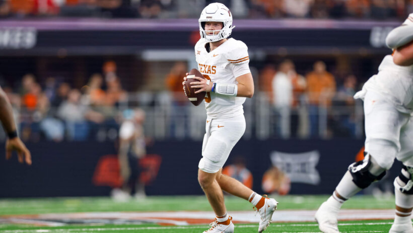 Texas Longhorns quarterback Quinn Ewers drops back to pass