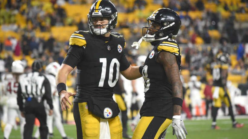 Pittsburgh Steelers quarterback Mitch Trubisky celebrates a touchdown with wide receiver Diontae Johnson