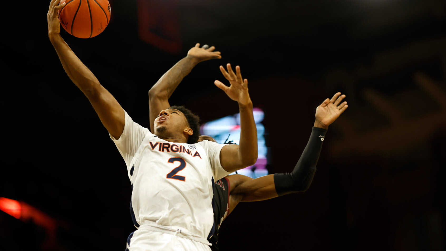 Virginia Cavaliers guard Reece Beekman goes for a layup