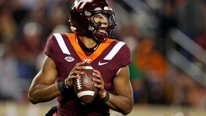 Virginia Tech Hokies quarterback Kyron Drones throws a pass