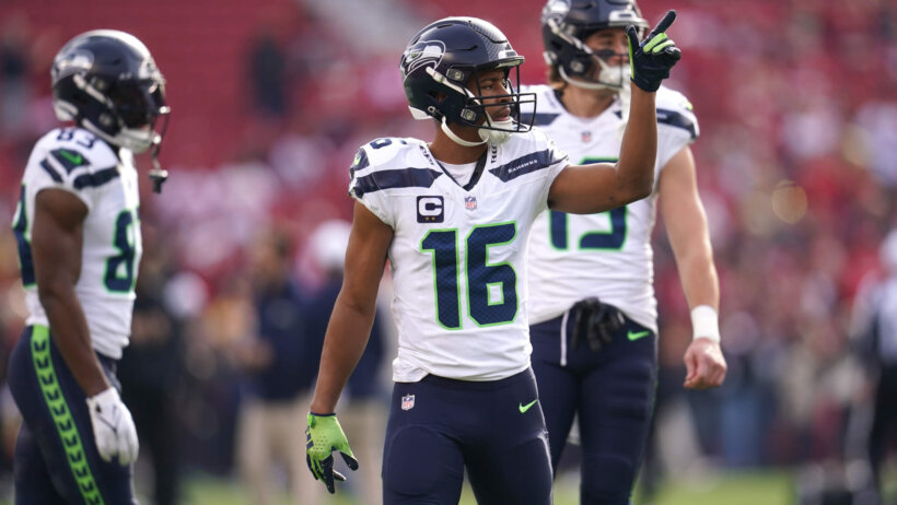 Seattle Seahawks wide receiver Tyler Lockett (16) stands on the field before the start of the game