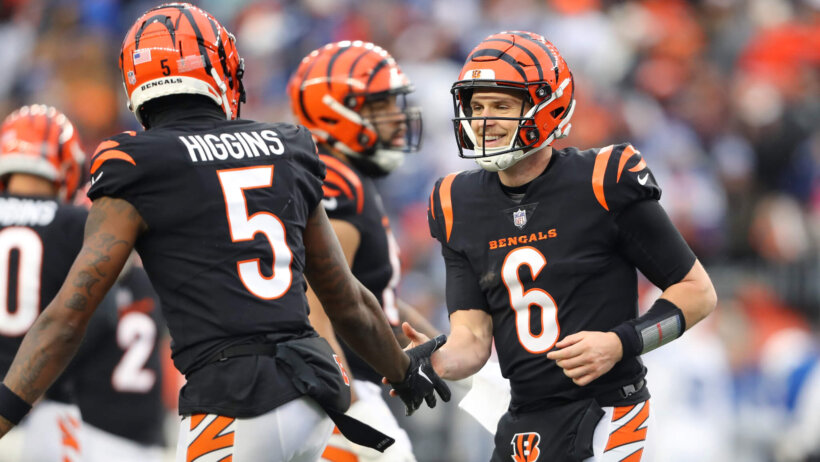 Cincinnati Bengals quarterback Jake Browning (6) celebrates his touchdown run