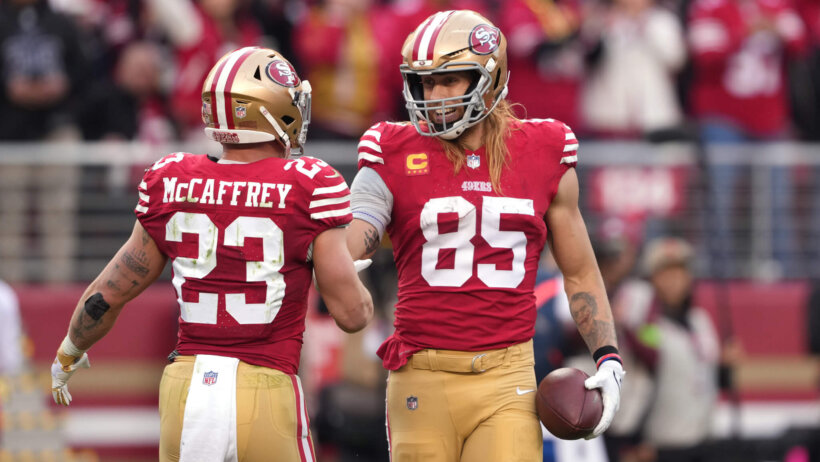 San Francisco 49ers tight end George Kittle (85) celebrates with running back Christian McCaffrey (23)