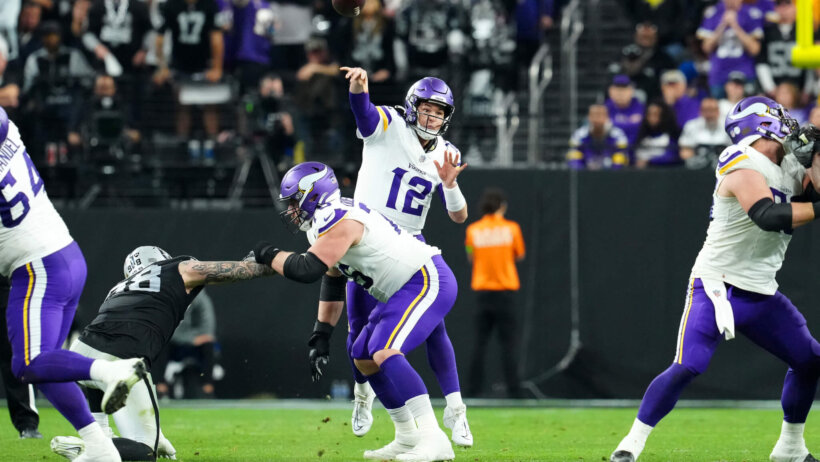 Minnesota Vikings quarterback Nick Mullens (12) makes a pass attempt