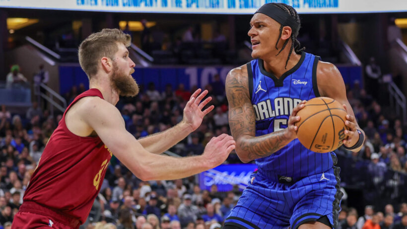 Orlando Magic forward Paolo Banchero looks to make a pass