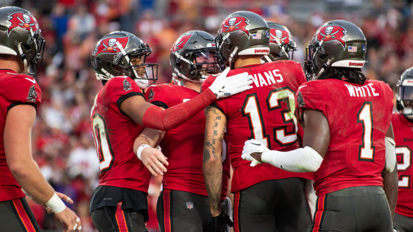 Tampa Bay Buccaneers quarterback Baker Mayfield (6) and wide receiver Mike Evans (13) celebrate a touchdown
