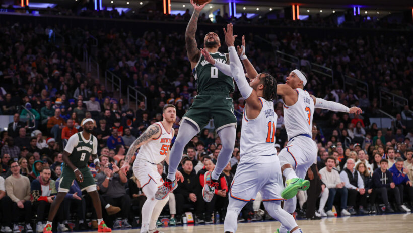 Milwaukee Bucks guard Damian Lillard shoots a floater
