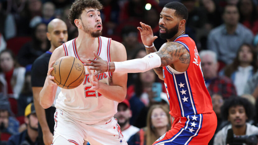 Houston Rockets center Alperen Sengun is guarded by Philadelphia 76ers forward Marcus Morris Sr