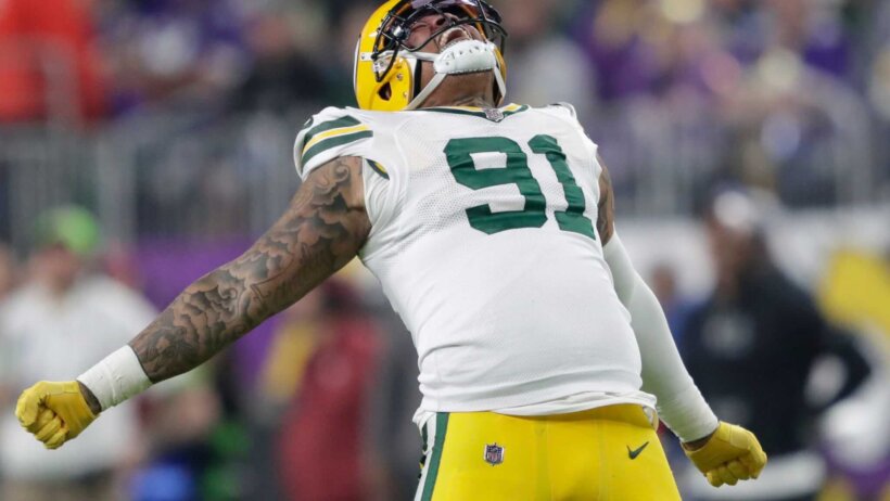 Green Bay Packers linebacker Preston Smith (91) celebrates forcing a fumble